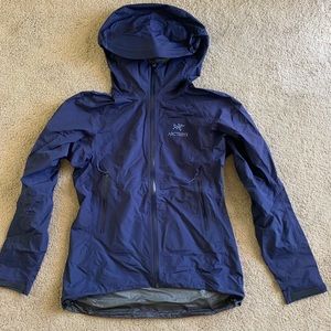 Arc’teryx women’s waterproof Gore-Tex bonded blue jacket.